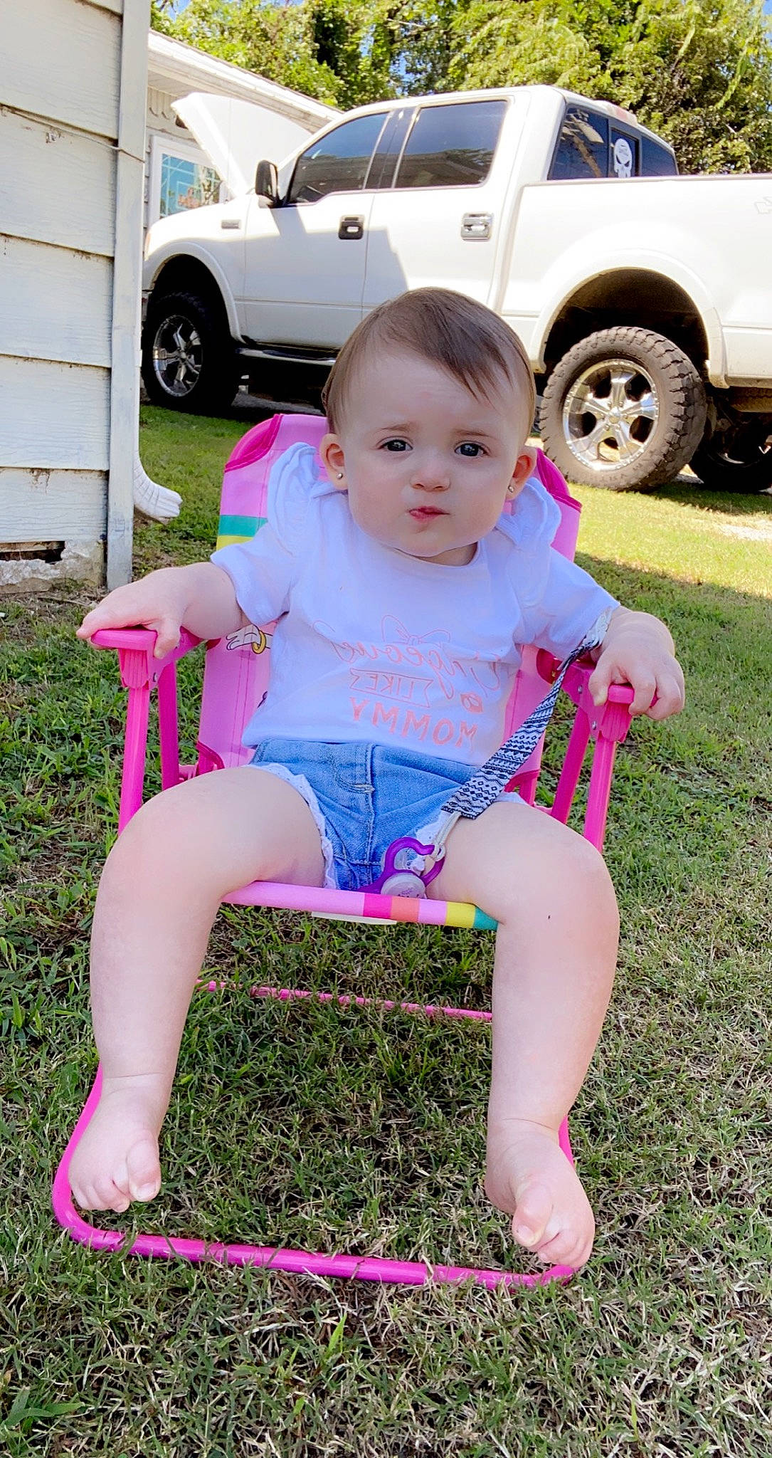 Addison joined the competition — help win amazing prizes! automotive_tire, baby_toddler_clothing, car, chair, child, fender, fun, grass, happy, magenta, motor_vehicle, person, pink, shorts, t_shirt, thigh, tire, toddler, vehicle, vehicle_door