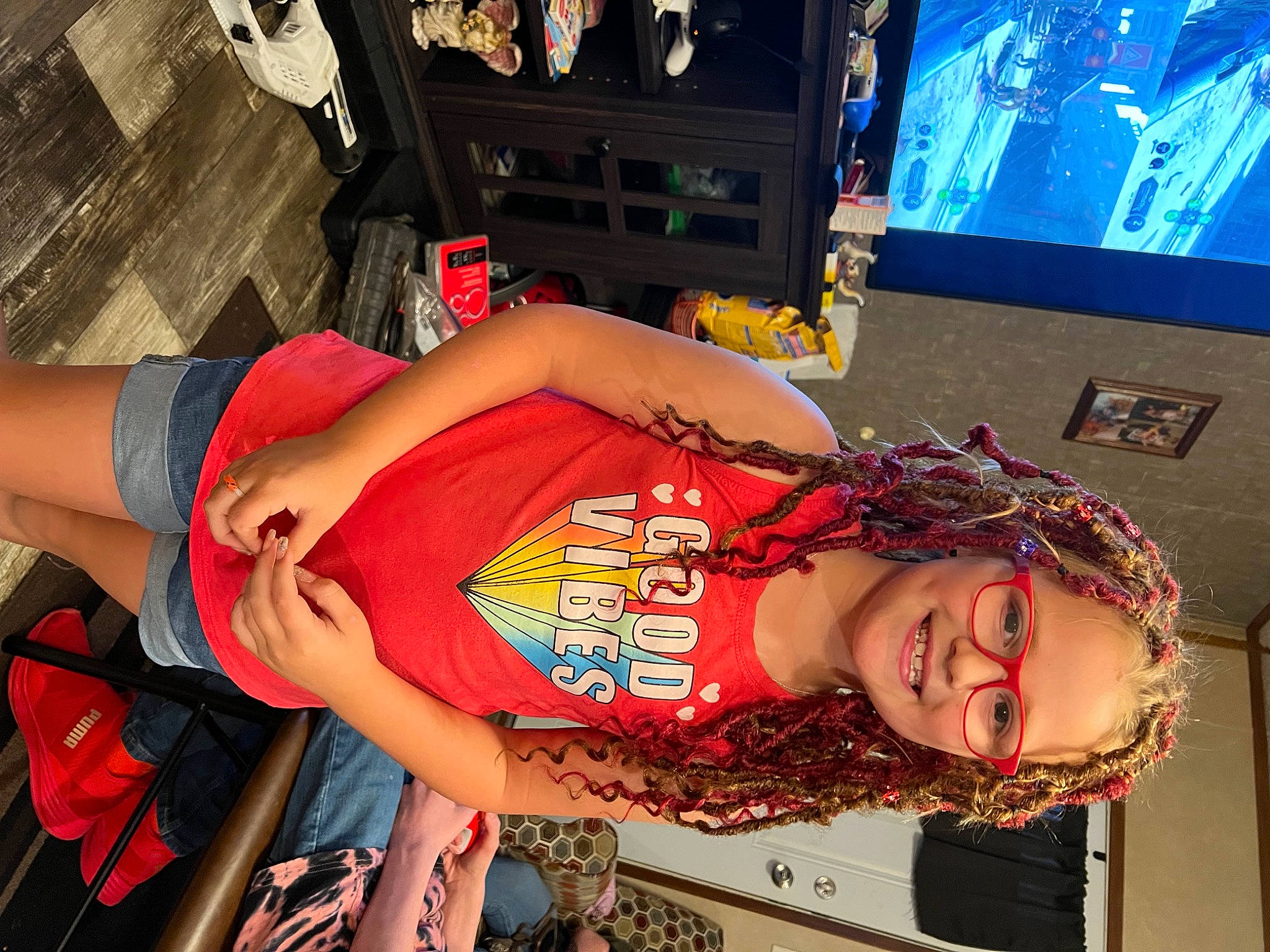 Adalynn is registered to the contest to win money with this photo: abdomen, display_device, elbow, eyewear, flesh, fun, human_body, human_leg, joy, leisure, machine, mouth, muscle, pattern, person, smile, thigh, trunk, visual_arts, wrist