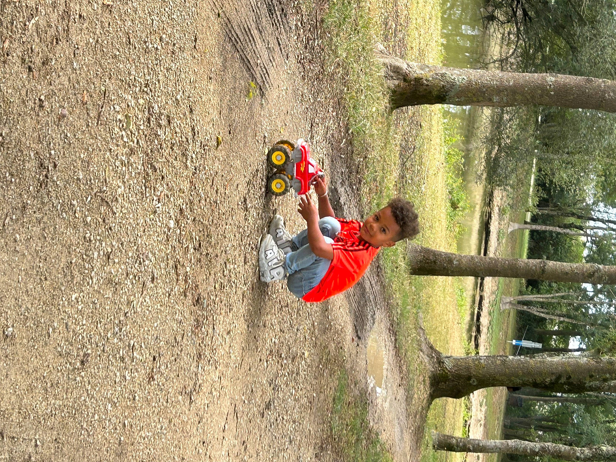 Keylan participe au concours pour gagner de l'argent avec cette photo : adventure, climbing_harness, ecoregion, extreme_sport, forest, fun, grass, happy, helmet, landscape, leisure, people_in_nature, person, plant, recreation, rock_climbing_equipment, soil, toddler, tree, trunk