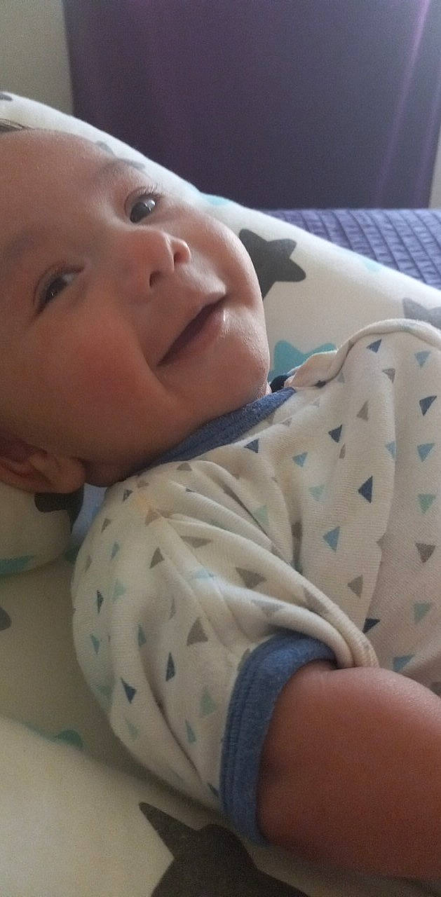 Alexander joined the competition — help win amazing prizes! baby, baby_toddler_clothing, cheek, chin, comfort, eyebrow, finger, head, human_body, iris, linens, lip, mouth, nose, pattern, person, skin, sleeve, smile, thumb