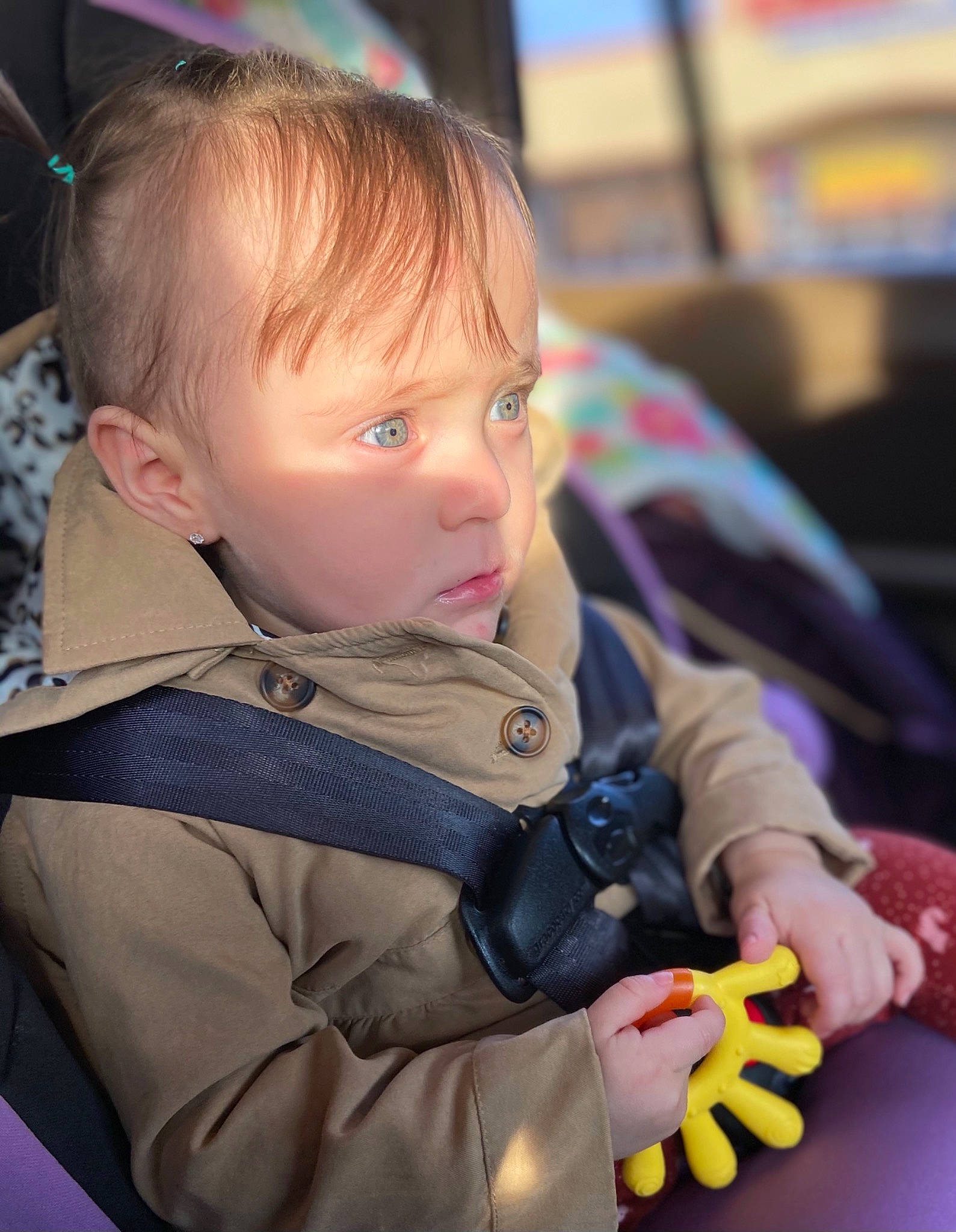 Sol is registered to the contest to win money with this photo: auto_part, baby, baby_carriage, baby_products, chair, cheek, child, fun, happy, iris, mammal, person, play, product, room, sitting, skin, toddler, toy