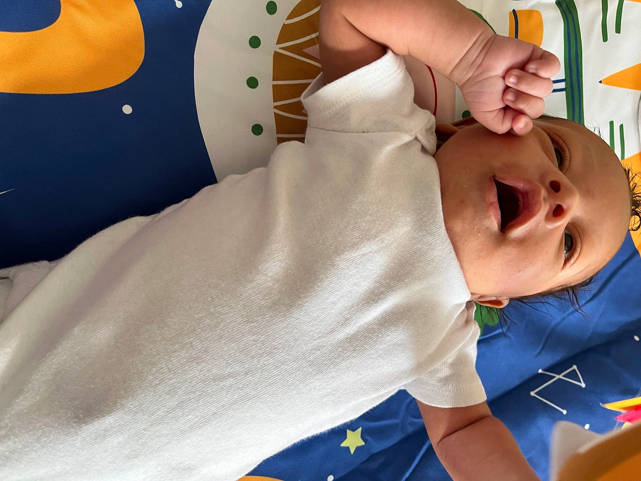 Jaxton is registered to the contest to win money with this photo: arm, baby, baby_products, baby_sleeping, baby_toddler_clothing, chest, child, comfort, elbow, happy, human_leg, leisure, linens, mouth, neck, pattern, person, skin, sleeve, thigh