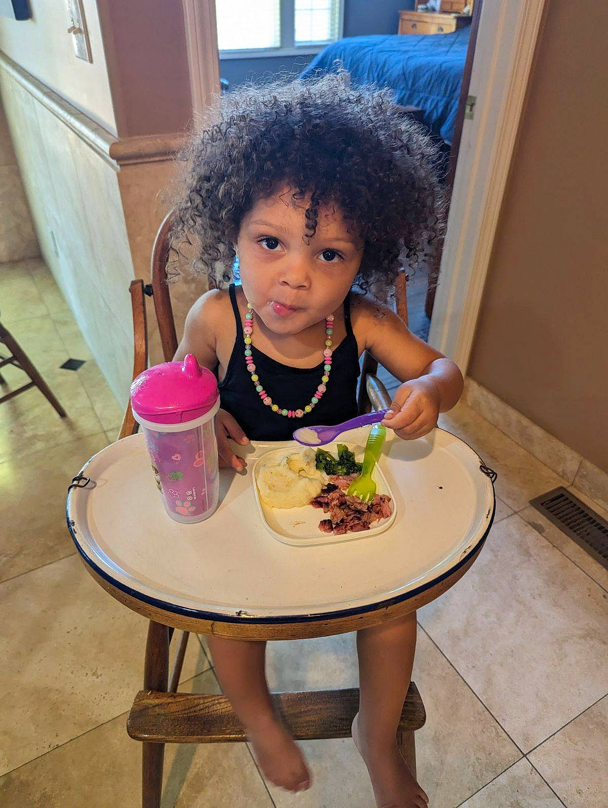 Izara is registered to the contest to win money with this photo: baby_toddler_clothing, child, comfort_food, eating, flooring, food, food_craving, fun, happy, meal, person, plate, play, room, sharing, sitting, skin, sweetness, table, tableware