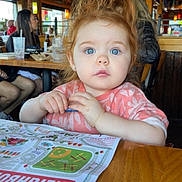 Kairi joined the competition — help win amazing prizes! activity_sheet, blue_eyes, casual, child, clothing, crayon, curly_hair, face, indoor, lighting, people, placemat, portrait, red_hair, restaurant, seated, table, toddler, woman, wooden_table