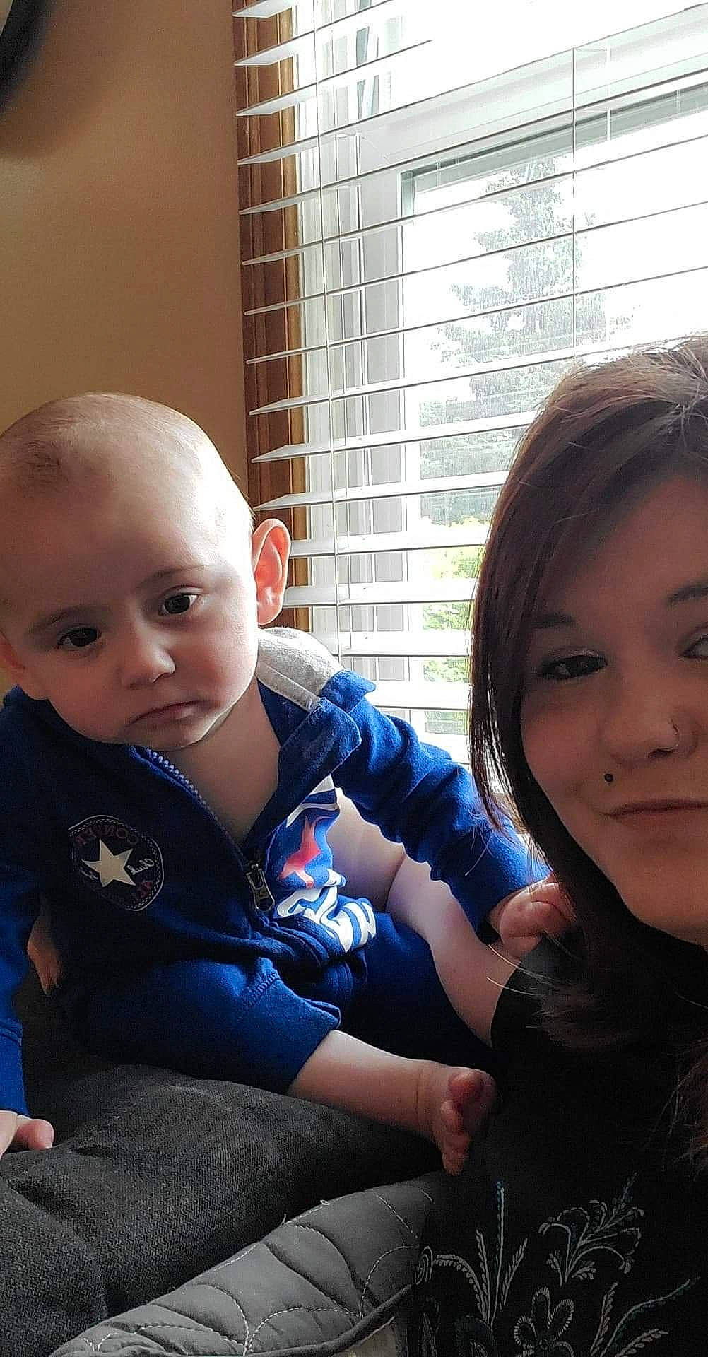 Zayne is registered to the contest to win money with this photo: baby, cheek, child, face, joy, person, sitting, skin, smile, toddler