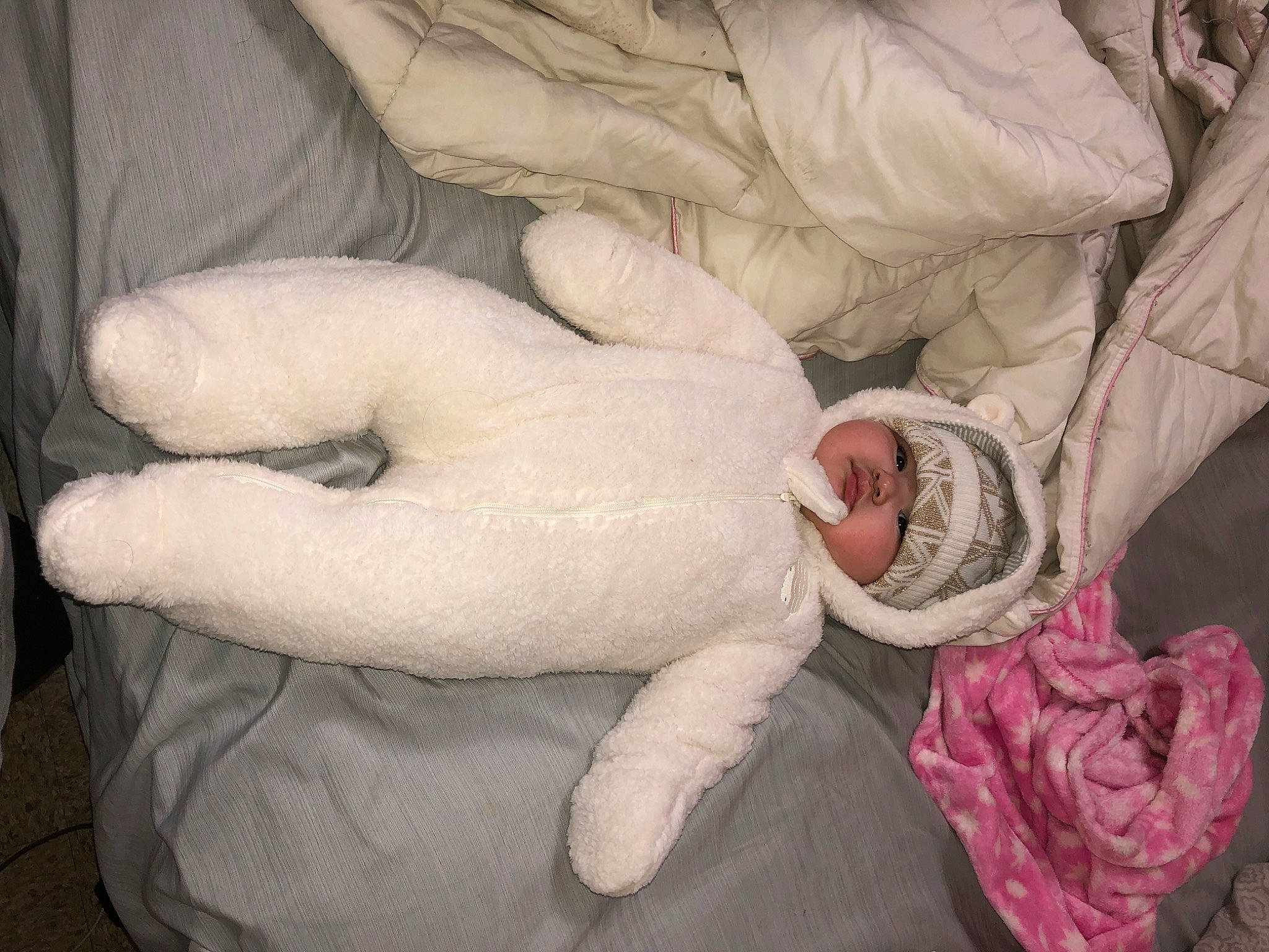 Leeyana is registered to the contest to win money with this photo: baby, baby_products, baby_sleeping, bedding, bedtime, carmine, child, comfort, fur, gesture, headwear, leg, linens, mammal, nap, person, room, sleep, stuffed_toy, tail