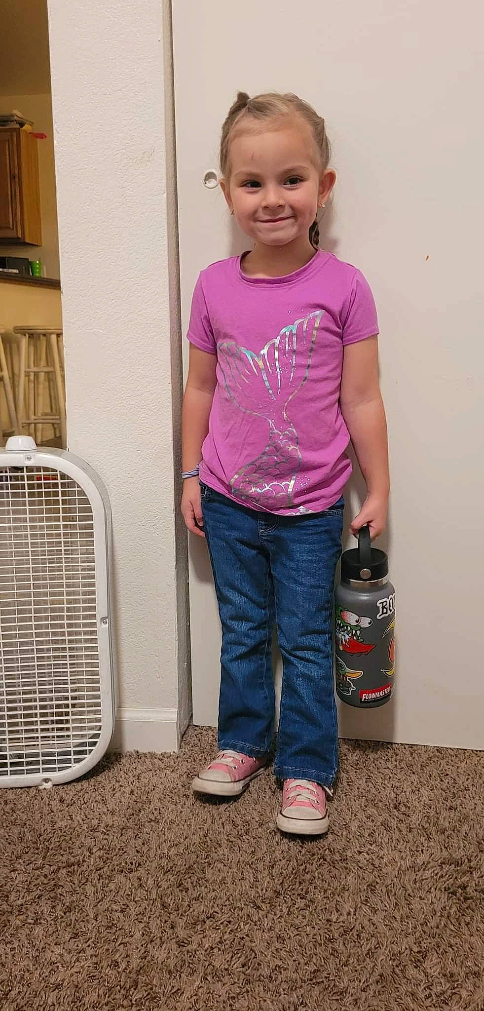 Riley is registered to the contest to win money with this photo: baby_toddler_clothing, child, clothing, denim, electric_blue, fun, gas, happy, human_leg, jeans, joy, luggage_and_bags, magenta, mesh, person, pink, product, sleeve, smile, t_shirt