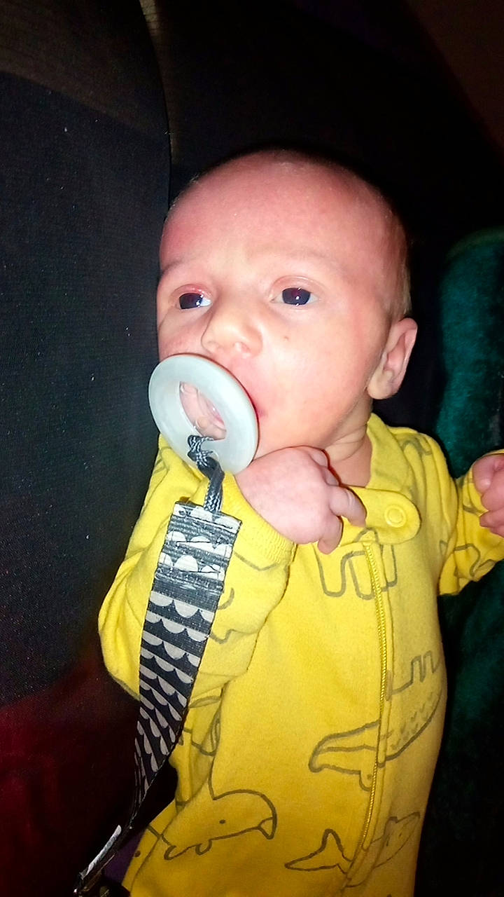 Zander is registered to the contest to win money with this photo: audio_equipment, baby, baby_toddler_clothing, cheek, child, curious, drinkware, ear, eyebrow, eyelash, finger, fun, happy, iris, mouth, nail, nose, person, sleeve, thumb