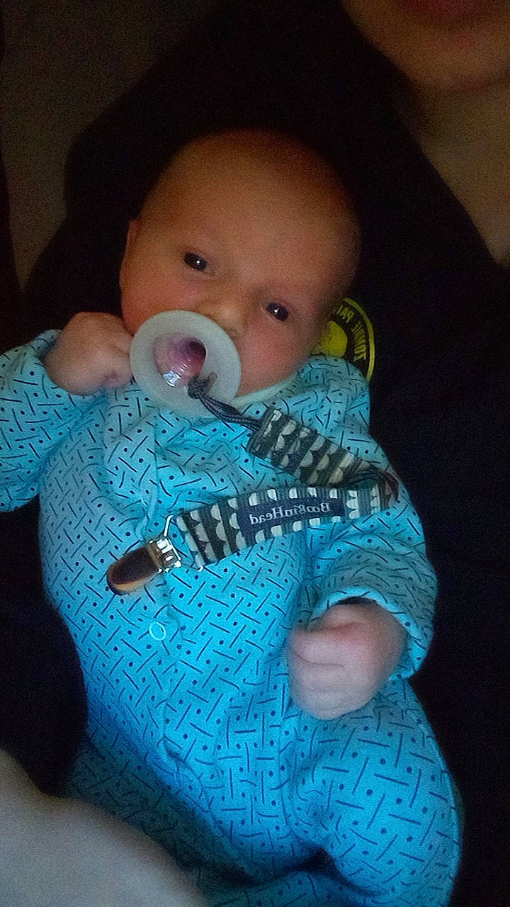 Zander is registered to the contest to win money with this photo: arm, azure, baby, baby_toddler_clothing, blue, cheek, comfort, cool, creative_arts, finger, hand, headgear, mouth, nail, person, skin, sleeve, textile, thumb, toddler