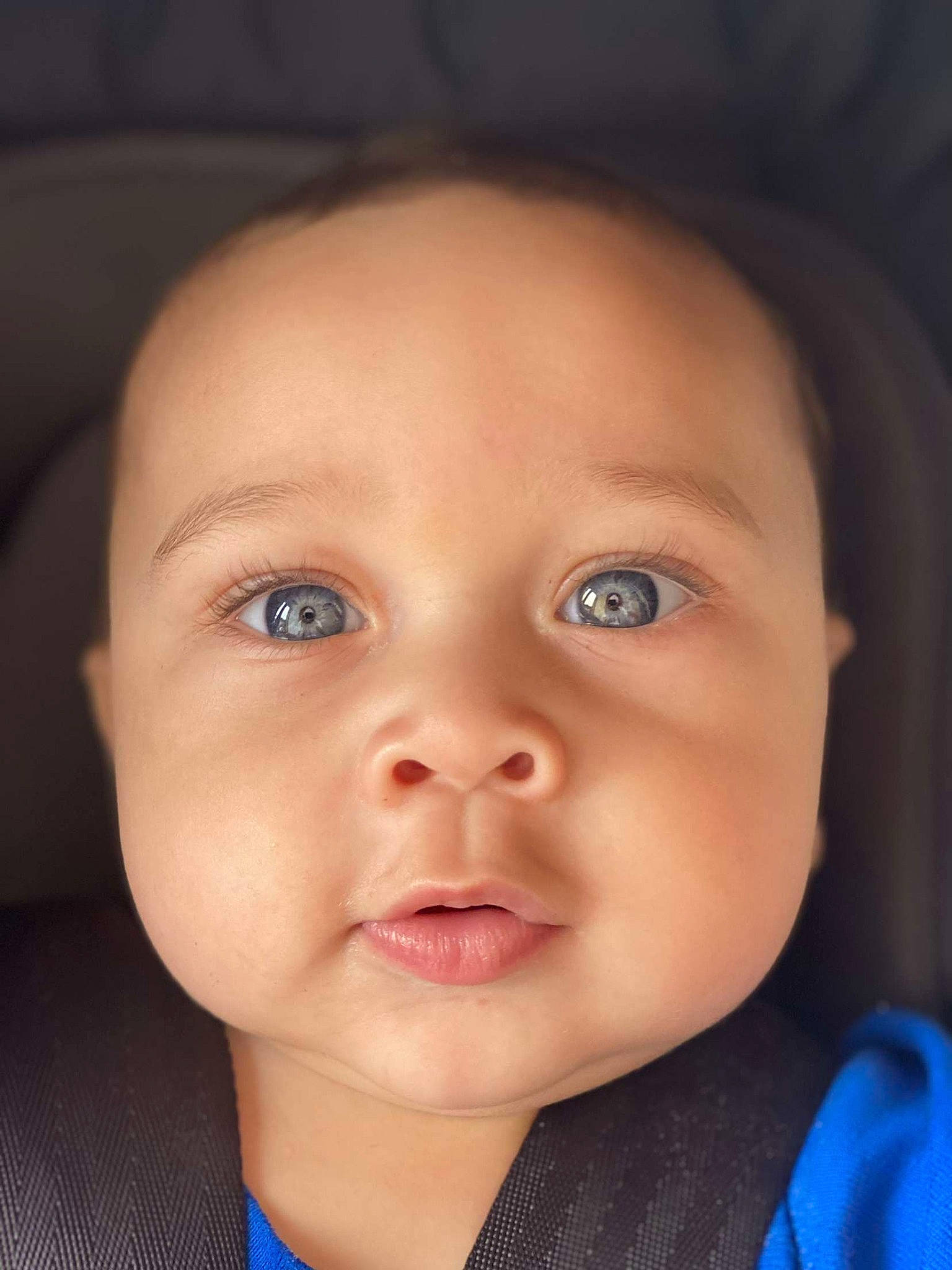 Eliyas is registered to the contest to win money with this photo: baby, baby_toddler_clothing, cheek, child, close_up, collar, ear, electric_blue, eyebrow, eyelash, flash_photography, fun, iris, lip, mouth, no_expression, nose, person, skin, sleeve