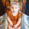 Charlea is registered to the contest to win money with this photo: accessories, baby, bodypart, clothing, costume, dress, face, finger, furniture, glasses, hand, happy, head, homedecor, jewelry, person, photography, portrait, sitting, smile