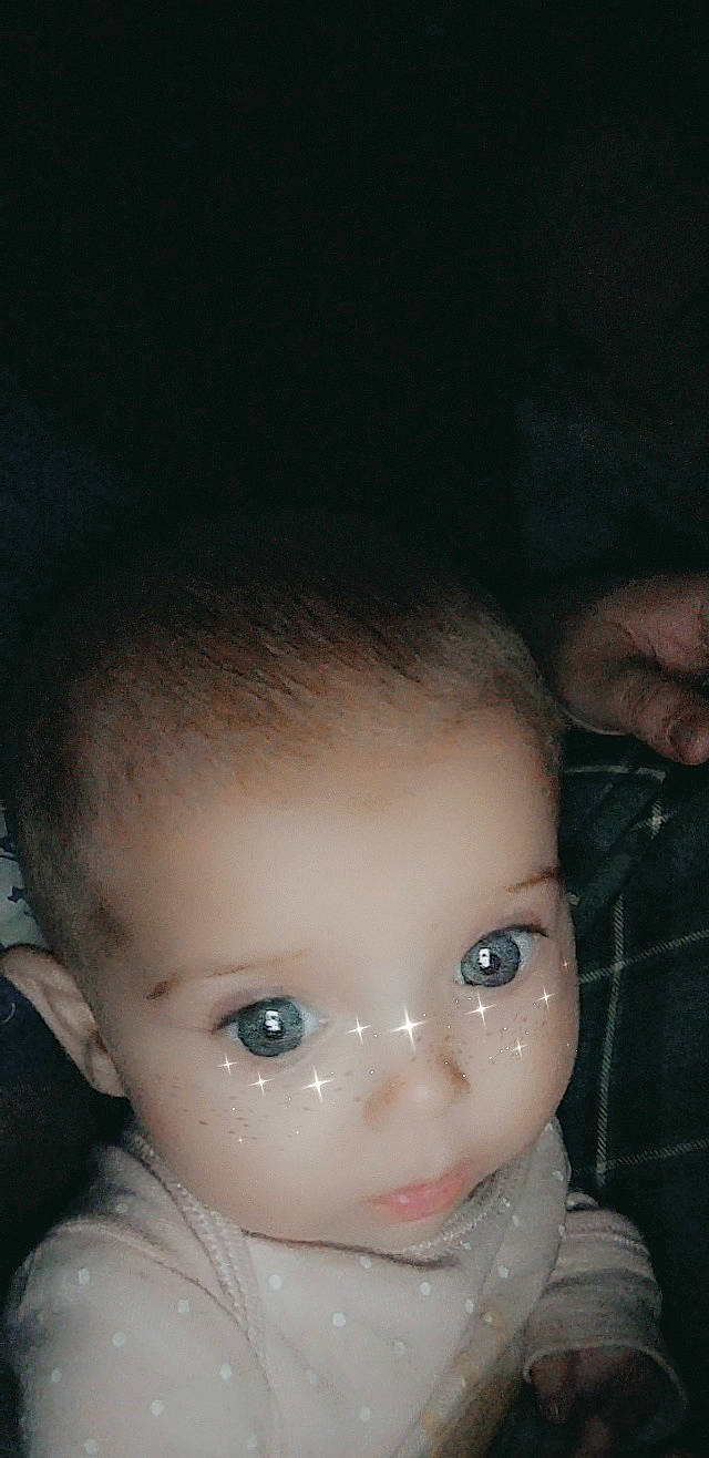 Riverlynn is registered to the contest to win money with this photo: black_hair, cheek, child, darkness, doll, ear, eyebrow, eyelash, flash_photography, forehead, gesture, human_body, iris, jaw, lip, mouth, no_expression, nose, person, skin