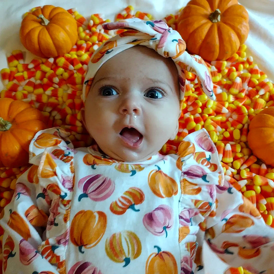 Riverlynn is registered to the contest to win money with this photo: baby, baby_toddler_clothing, calabaza, child, cucurbita, event, eye, face, gourd, happy, headwear, natural_foods, orange, organ, person, plant, pumpkin, squash, sweetness, toddler