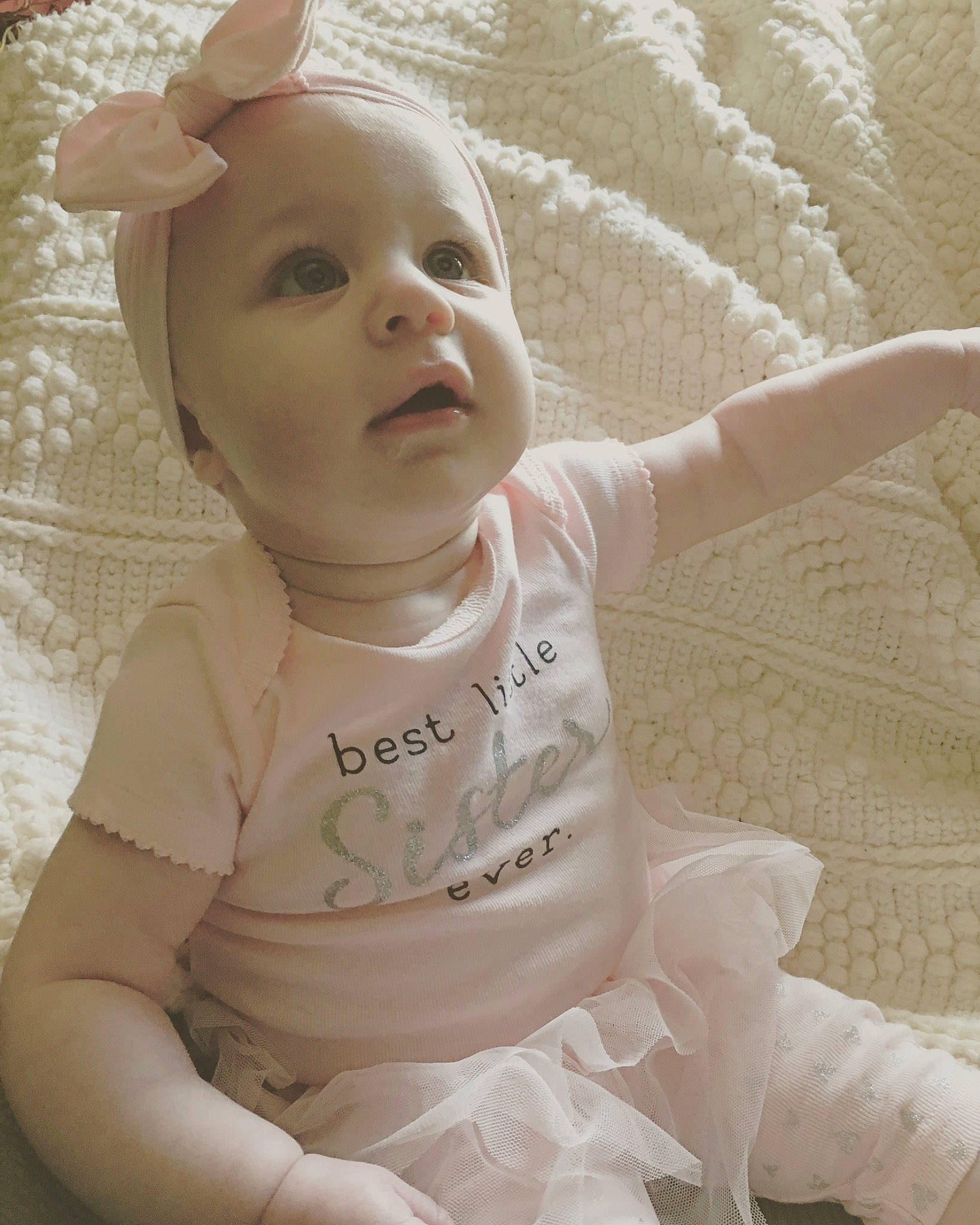 Maelynn is registered to the contest to win money with this photo: baby, baby_toddler_clothing, cheek, child, ear, person, pink, skin, smile, toddler