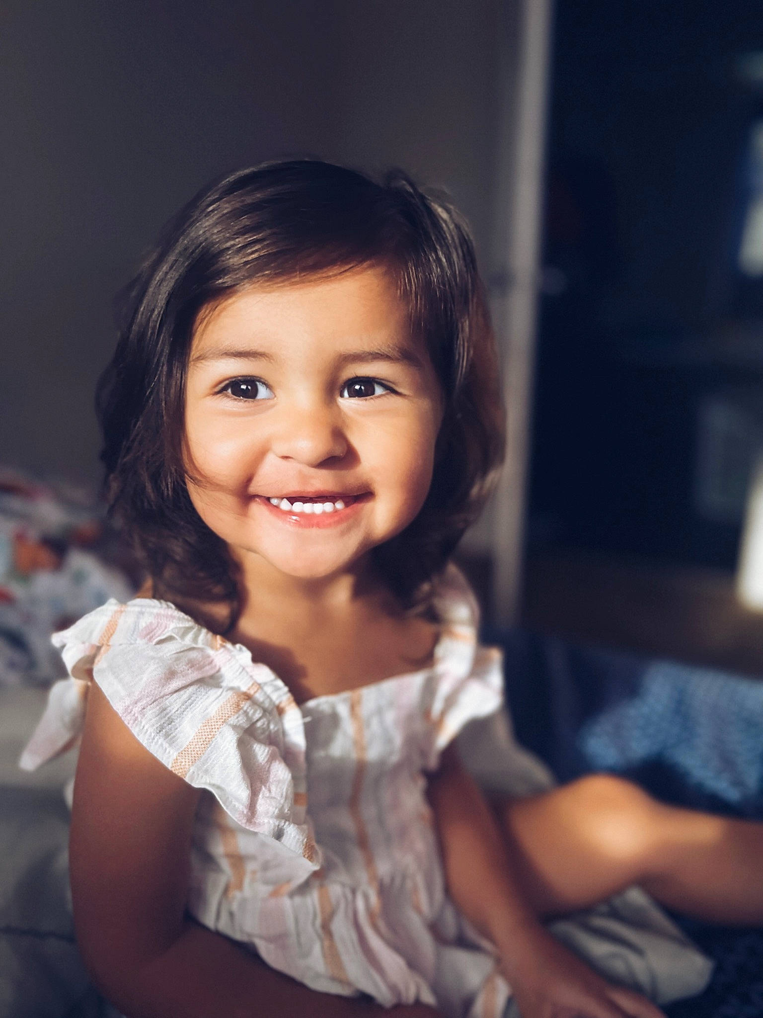 Ruby is registered to the contest to win money with this photo: black_hair, cheek, child, child_model, elbow, eyelash, flash_photography, fun, happy, human_leg, joy, laugh, long_hair, person, photo_shoot, portrait, portrait_photography, sitting, skin, smile