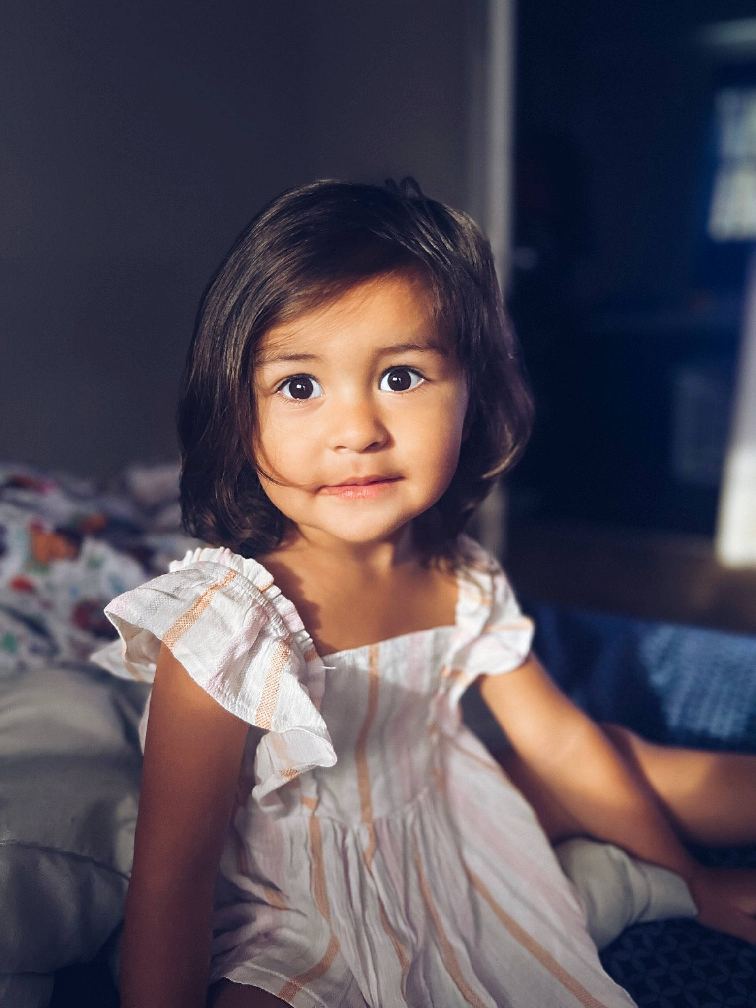 Ruby is registered to the contest to win money with this photo: black_hair, brown_hair, cheek, child, chin, eye, eyebrow, eyelash, face, facial_expression, flash_photography, happy, human_leg, iris, lip, long_hair, person, shoulder, skin, smile