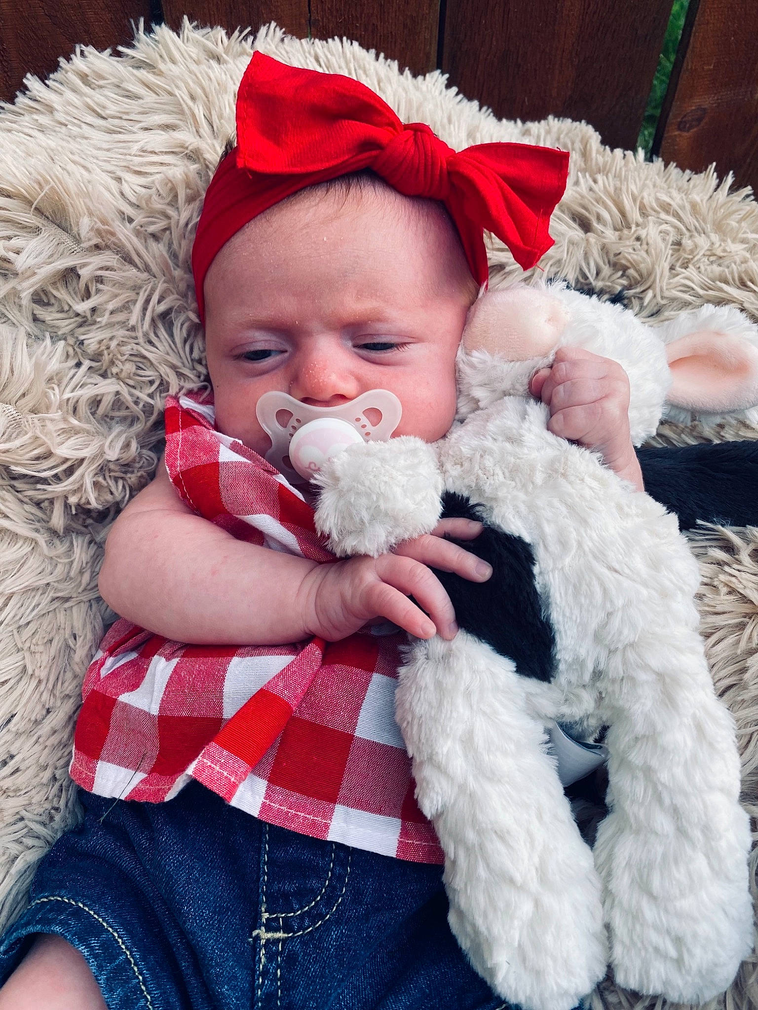 Oaklee is registered to the contest to win money with this photo: baby, baby_toddler_clothing, beard, blue, cheek, child, clothing, comfort, eye, face, happy, head, iris, lip, person, pink, santa_claus, skin, textile, toddler