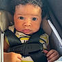 Yahson Mayberry joined the competition — help win amazing prizes! baby, infant, car_seat, harness, blanket, curly_hair, cute, child, portrait, closeup, straps, clothing, hand, face, seat, safety, expression, indoor, person, young