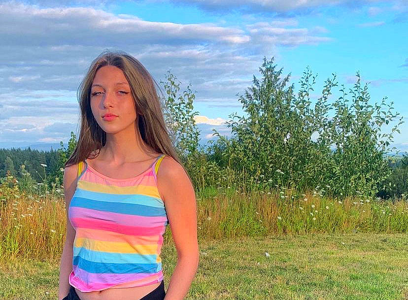 Cecilee is registered to the contest to win money with this photo: azure, cloud, flash_photography, grass, grass_family, grassland, hair, hairstyle, happy, landscape, meadow, natural_landscape, neck, people_in_nature, person, plain, plant, sky, thigh, tree