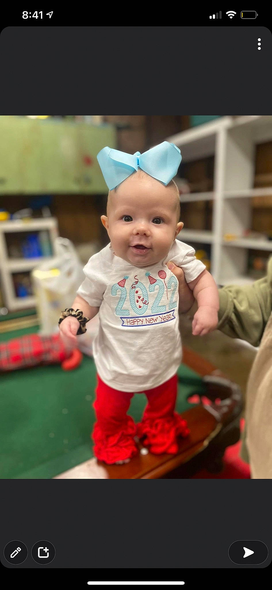 Mattelyn is registered to the contest to win money with this photo: baby, baby_products, baby_toddler_clothing, child, costume_hat, event, fashion_accessory, fictional_character, fun, happy, hat, head, person, pink, shelf, skin, sleeve, smile, sock, textile