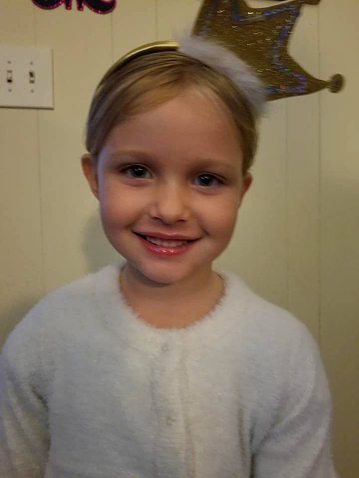 Emrie is registered to the contest to win money with this photo: blond, child, ear, eyebrow, face, fashion_accessory, forehead, hair, hair_accessory, hairstyle, head, headband, headgear, headpiece, joy, lip, person, smile, toddler, tooth