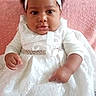 Yuhanna a rejoint le concours — aidez-le/la à gagner de superbes lots ! adorable, baby, bow, child, couch, cute, eyes, fabric, hair, hands, headband, indoor, infant, jewelry_belt, lace_dress, person, pink_background, portrait, sitting, smiling