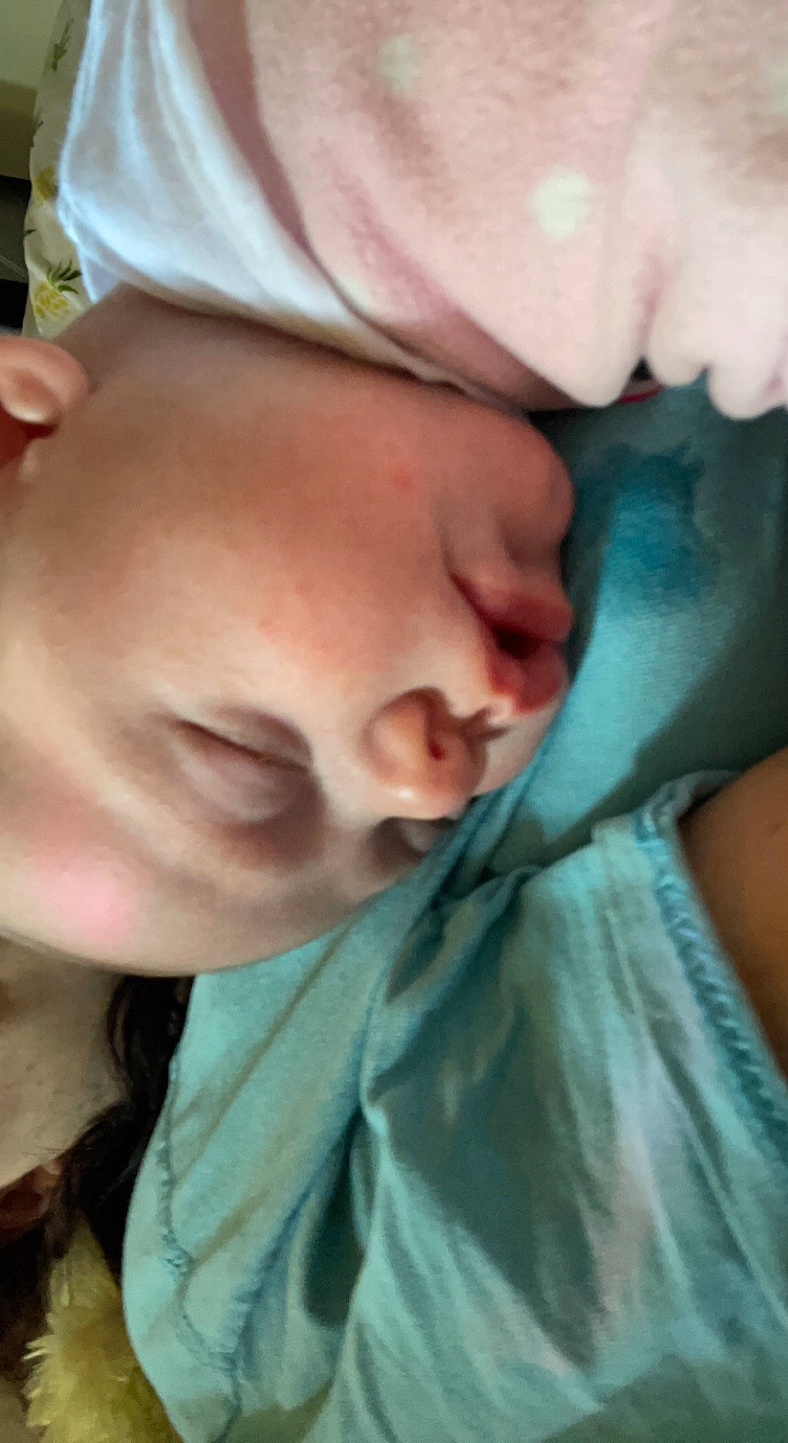 Olive is registered to the contest to win money with this photo: baby, cheek, child, chin, comfort, ear, eyebrow, eyelash, finger, forehead, gesture, happy, jaw, lip, mouth, neck, nose, person, skin, thumb