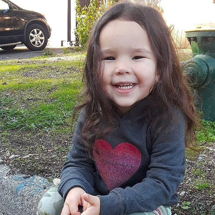 Reagan is registered to the contest to win money with this photo: beauty, car, child, cool, eye, face, facial_expression, fun, grass, hair, hand, happy, head, joy, leaf, lip, long_hair, nose, person, smile