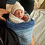 Abel joined the competition — help win amazing prizes! newborn, baby, sleeping, hat, blanket, crocheted_blanket, person, hand, bed, comfort, indoor, rest, cozy, wrapped, infant, cute, peaceful, skin, clothing, toddler