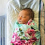Charleigh joined the competition — help win amazing prizes! newborn, baby, sleeping, blanket, floral, swaddled, infant, hospital, bed, soft, peaceful, cute, face, person, child, wrapped, resting, skin, head, young