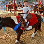 Canon joined the competition — help win amazing prizes! child, toddler, pony, saddle, red_saddle_blanket, outdoor, tent, people, photography, fence, horse_ride, event, leisure, animal, person, footwear, casual_clothing, daylight, woodchips, background