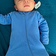 Felix joined the competition — help win amazing prizes! baby, sleeping, blue_onesie, pacifier, infant, peaceful, lying_down, child, soft_fabric, nap_time, cozy, cute, face, head, human, skin, small_child, resting, indoors, portrait