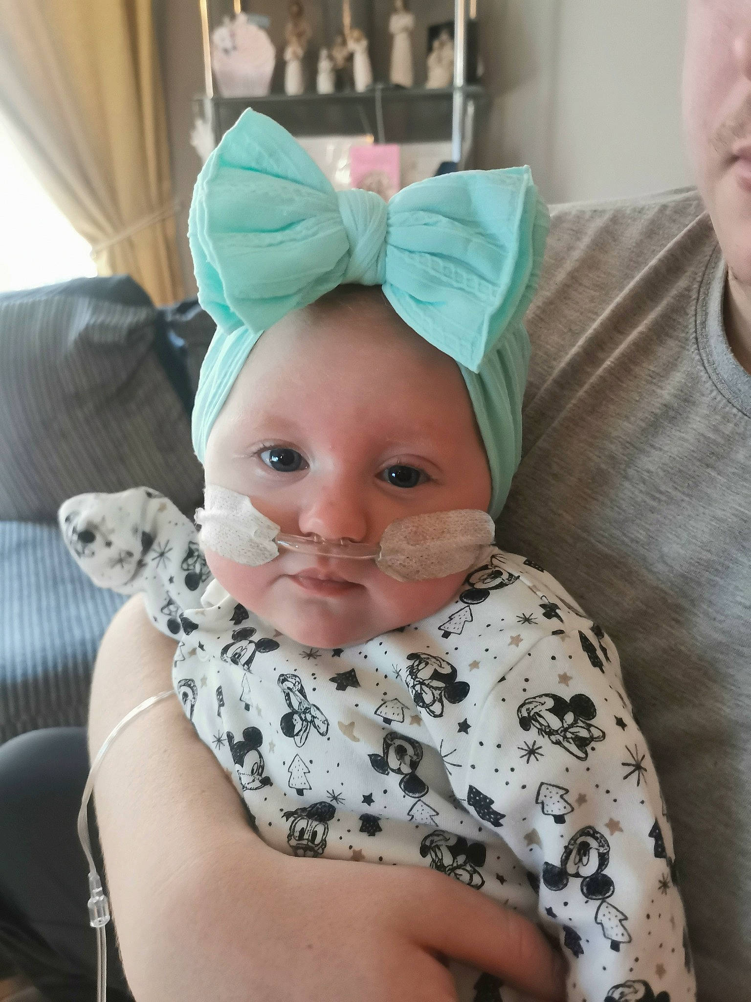 Holly is registered to the contest to win money with this photo: baby, baby_products, baby_toddler_clothing, cap, child, comfort, costume_hat, curtain, fashion_accessory, happy, hat, headpiece, linens, person, room, selfie, sitting, sleeve, t_shirt, textile