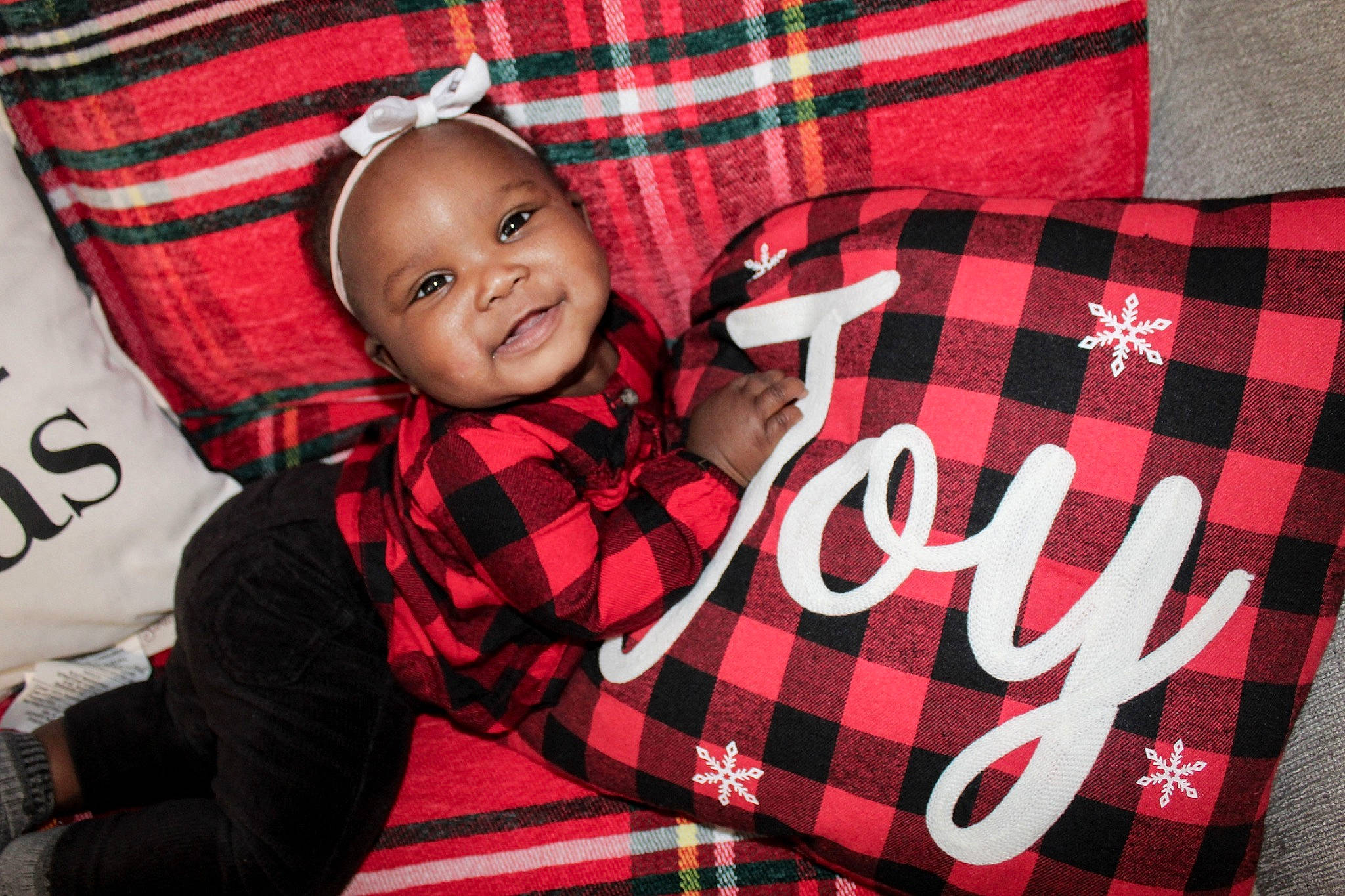Kamryn joined the competition — help win amazing prizes! baby, baby_toddler_clothing, child, comfort, design, event, font, happy, joy, linens, outerwear, pattern, person, plaid, red, sleeve, smile, t_shirt, tartan, textile