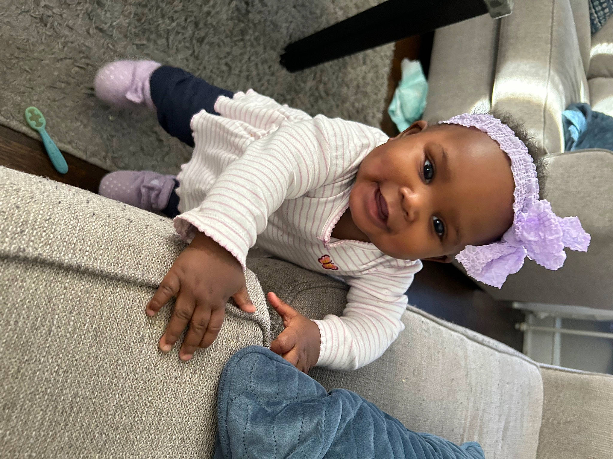 Kamryn is registered to the contest to win money with this photo: arm, baby, baby_products, beauty, child, comfort, doll, finger, fun, hairstyle, hand, happy, human, joint, person, sitting, skin, smile, textile, toddler