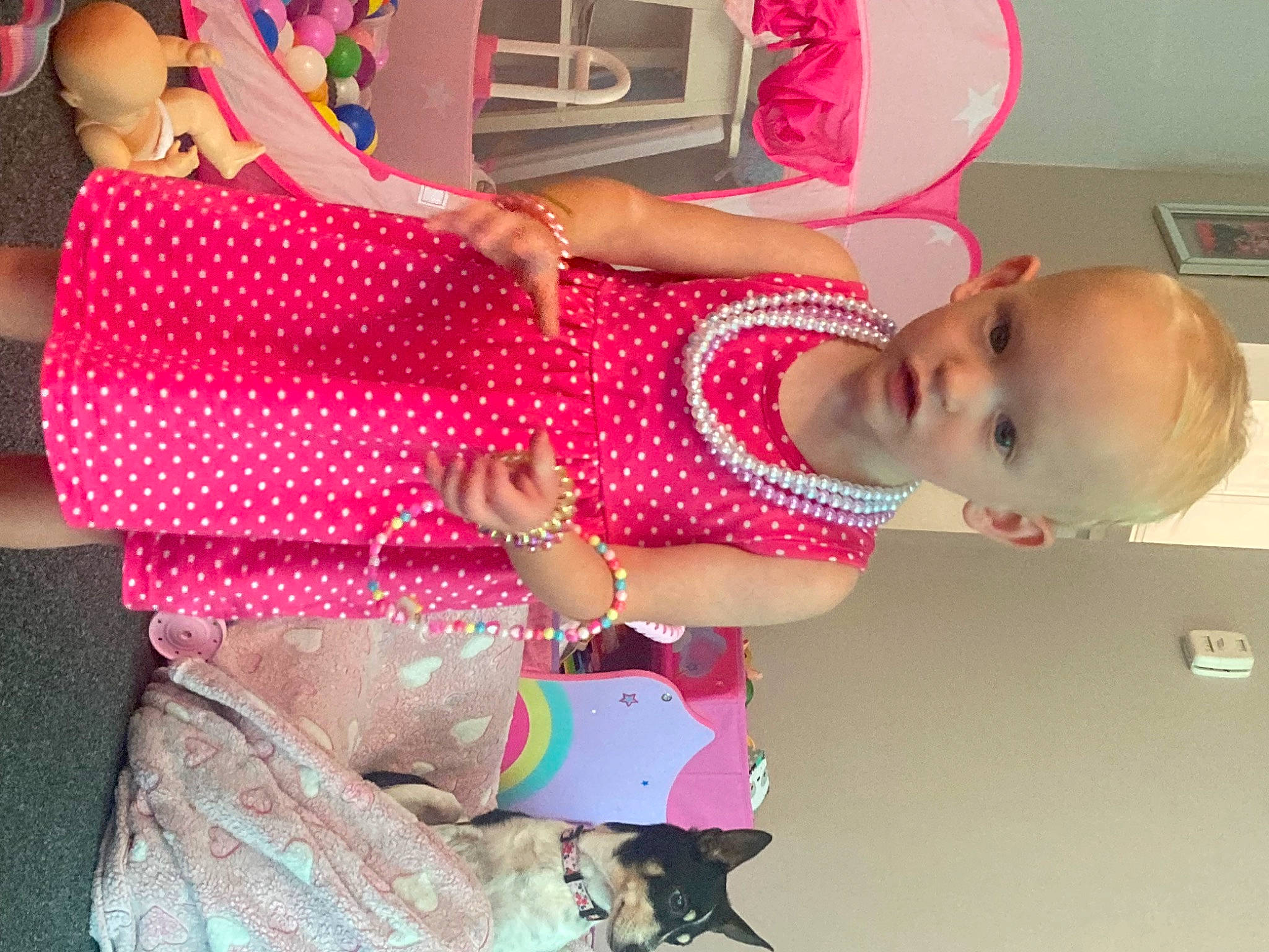 Amaya is registered to the contest to win money with this photo: baby, baby_products, baby_toddler_clothing, child, finger, fun, happy, kitchen_appliance, magenta, pattern, peach, person, pink, polka_dot, refrigerator, room, sleeve, toddler, toy, wrist