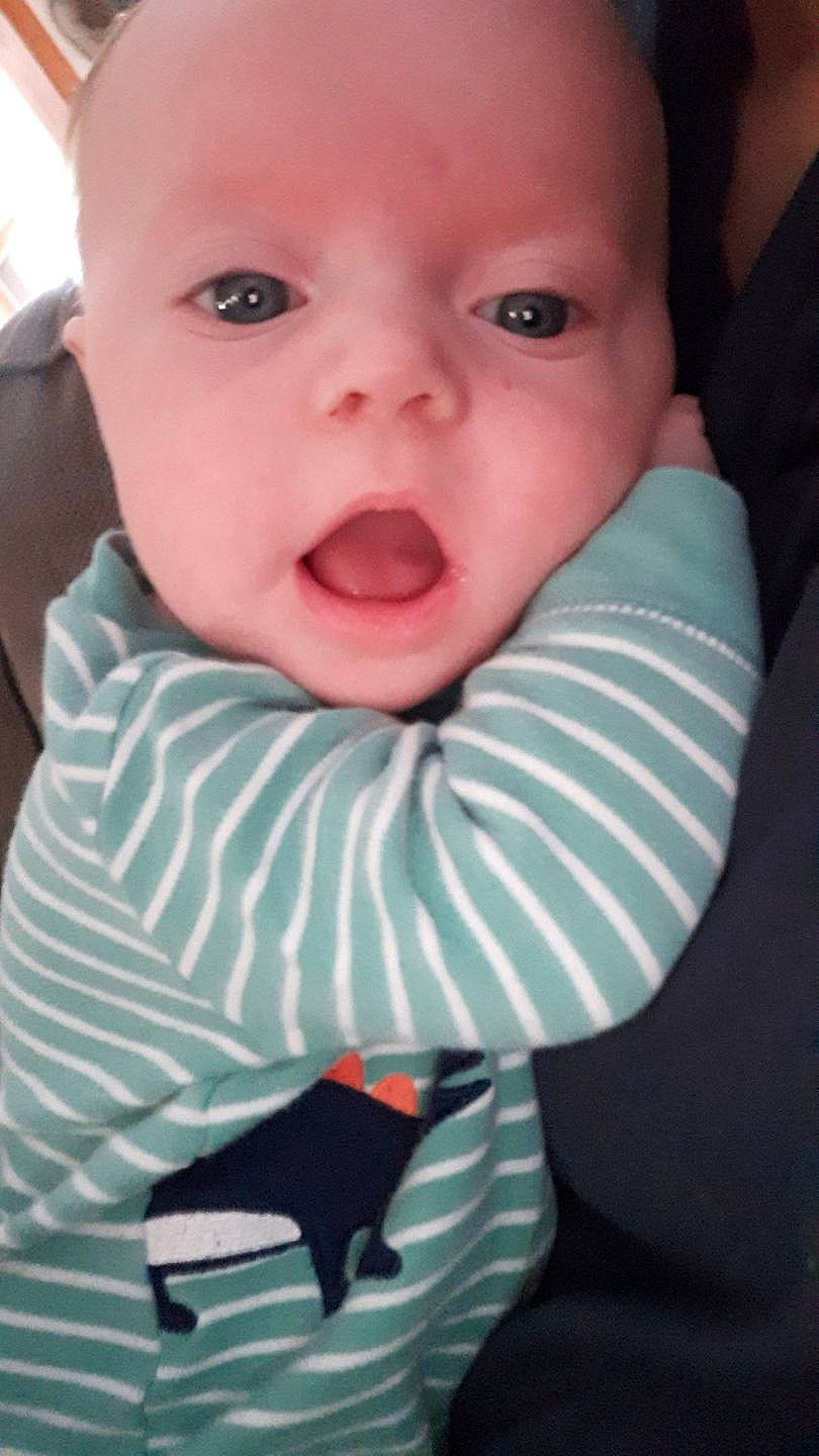 Oakland is registered to the contest to win money with this photo: baby, cheek, child, chin, cool, eye, face, facial_expression, forehead, head, iris, lip, mouth, neck, nose, organ, person, skin, smile, toddler