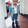toddler, child, denim_jacket, shorts, sneakers, indoor, floor, wooden_floor, adult, people, window, door, jewelry, socks, casual, home, living_room, person, fashion, portrait