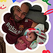 Adelie participe au concours pour gagner de l'argent avec cette photo : man, baby, blanket, couch, smile, pacifier, face, person, indoors, colorful, pattern, clothing, relaxation, cute, doodle, frame, happy, family, resting, casual