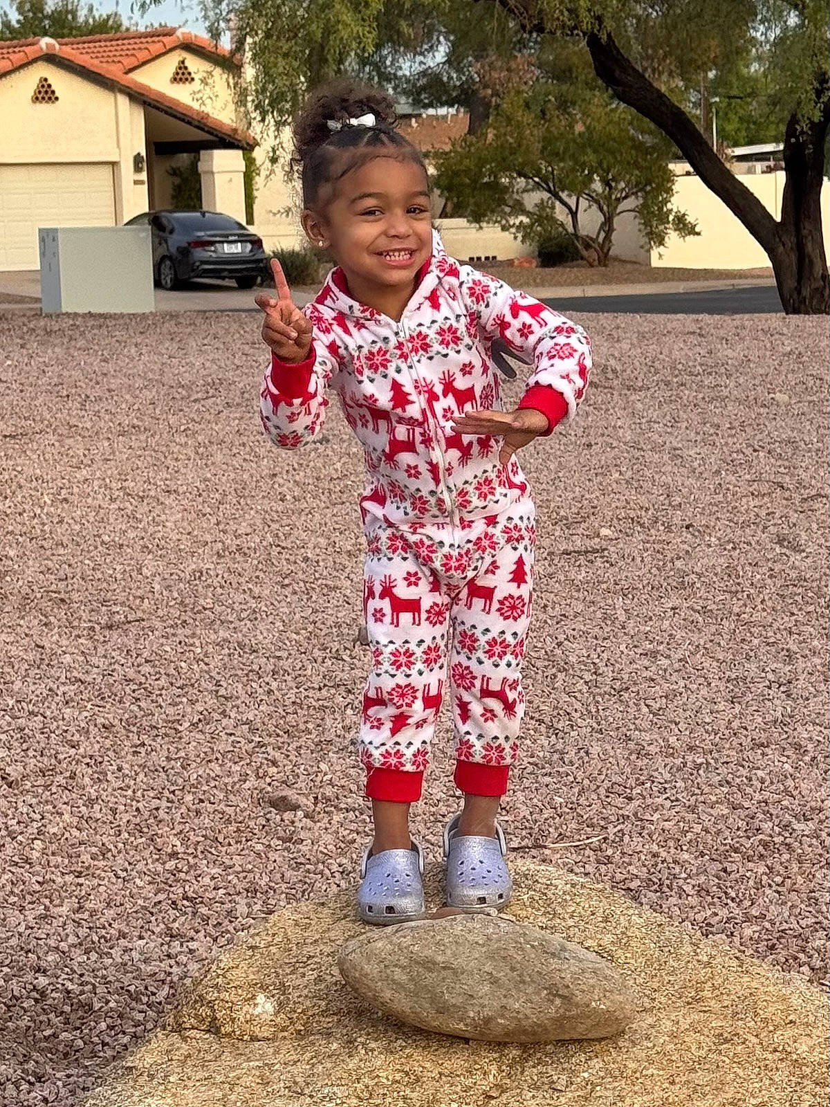 Zayla joined the competition — help win amazing prizes! bodypart, child, clothing, face, female, finger, girl, grass, hand, head, nature, outdoors, pants, park, person, photography, plant, portrait, rock, tree