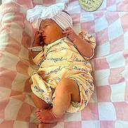 Adalynn joined the competition — help win amazing prizes! newborn, baby, sleeping, infant, portrait, bow, headband, onesie, blanket, pink, checkered, hospital, wristband, curled, feet, hands, peaceful, indoors, bedding, birth_announcement