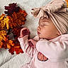 Adalynn joined the competition — help win amazing prizes! newborn, baby, sleeping, infant, portrait, pink_clothing, turban, headwrap, autumn_leaves, leaves, seasonal, cozy, blanket, closeup, face, hands, indoors, soft_lighting, peaceful, fashion