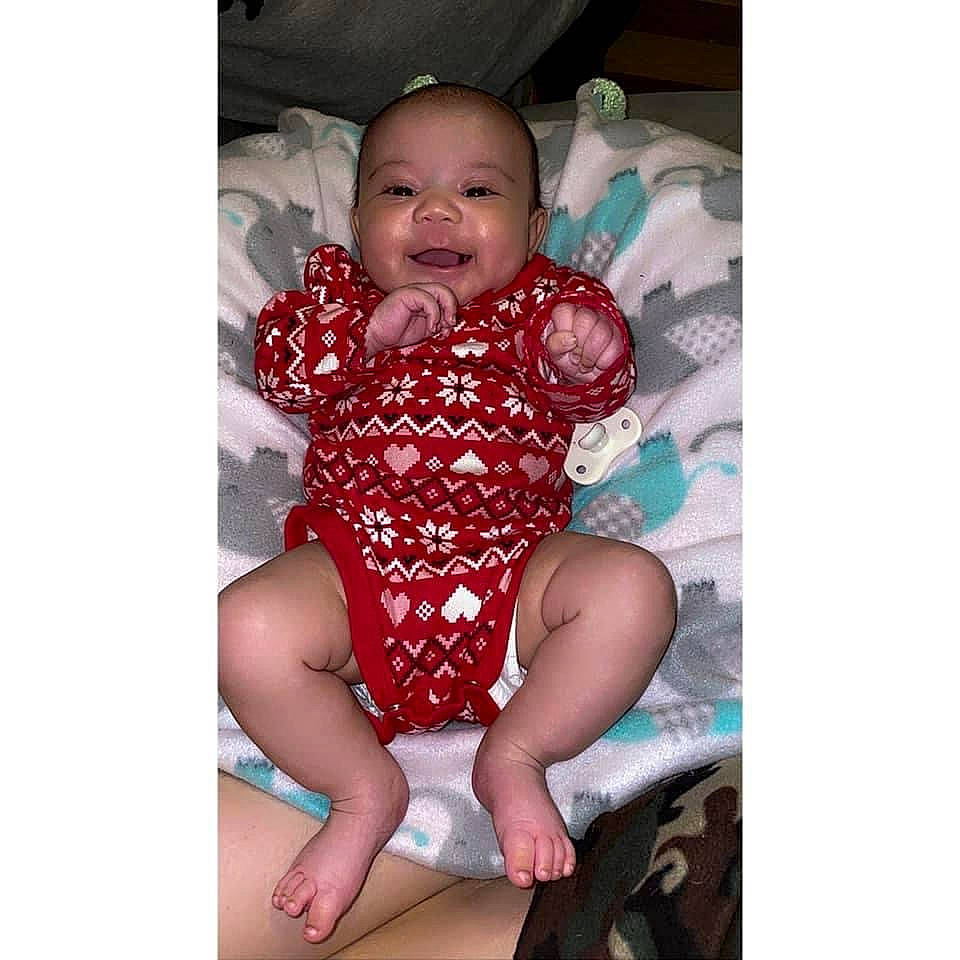Ka'Miya joined the competition — help win amazing prizes! baby, baby_toddler_clothing, comfort, dress, eye, face, happy, head, human_body, iris, knee, magenta, neck, pattern, person, skin, sleeve, smile, thigh, thumb
