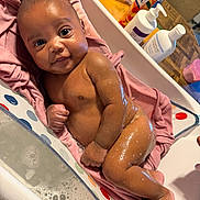 Aalaya is registered to the contest to win money with this photo: baby, infant, bath, towel, skin, water, soap, lotion, bathtub, pink, happy, smiling, wet, cute, child, person, indoor, bathroom, clean, relaxing