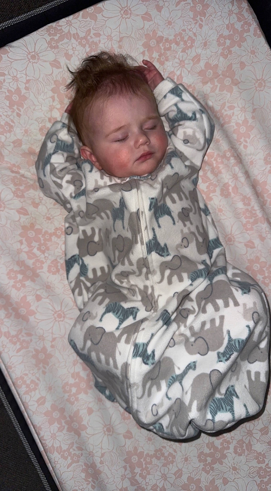 Everleigh is registered to the contest to win money with this photo: baby, baby_products, baby_toddler_clothing, camouflage, carmine, child, comfort, face, head, linens, military_camouflage, outerwear, pattern, person, sitting, sleep, sleeve, textile, toddler