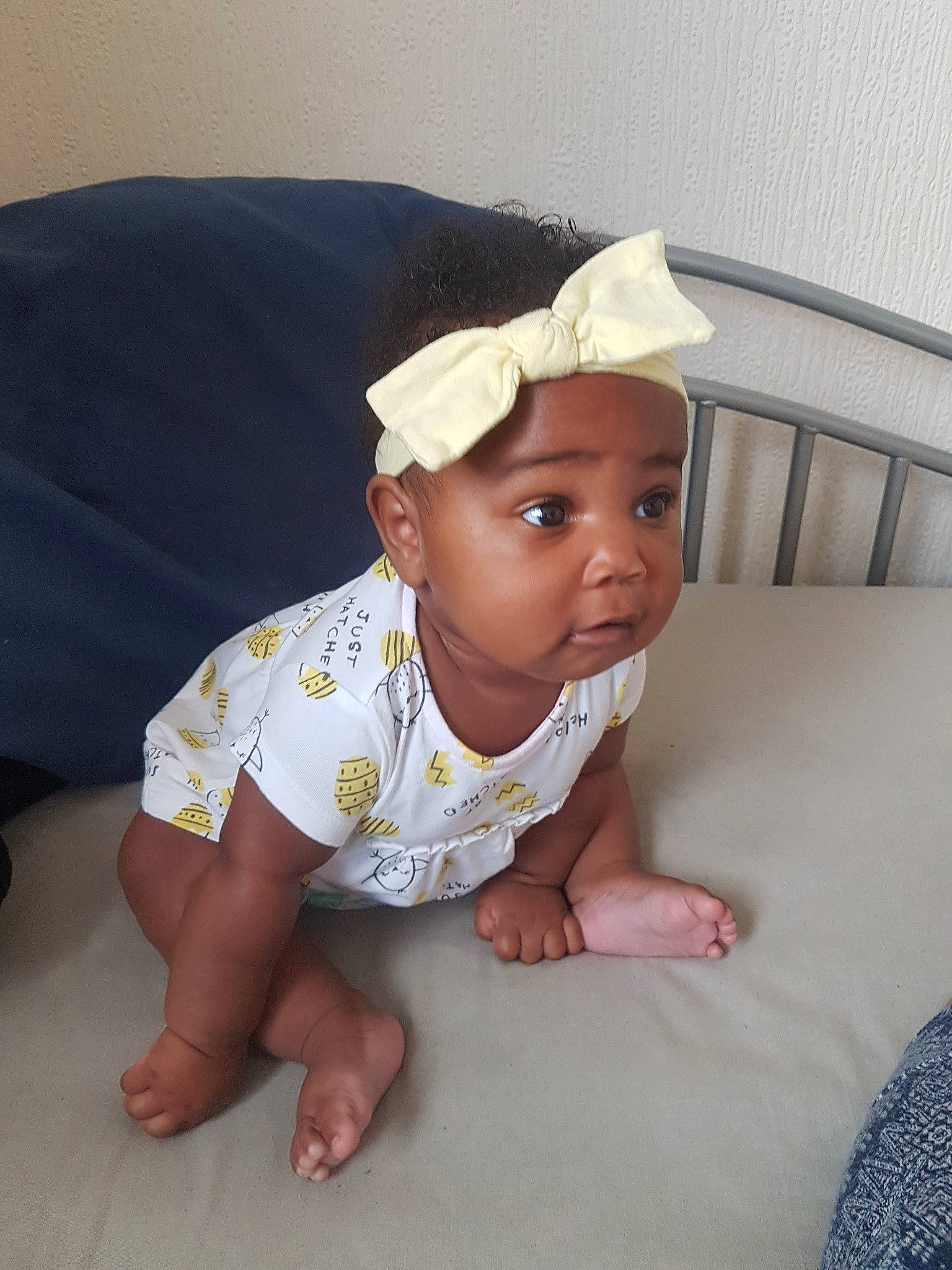 Aurèlia is registered to the contest to win money with this photo: baby, baby_toddler_clothing, child, finger, headgear, headwear, person, sitting, skin, smile, toddler