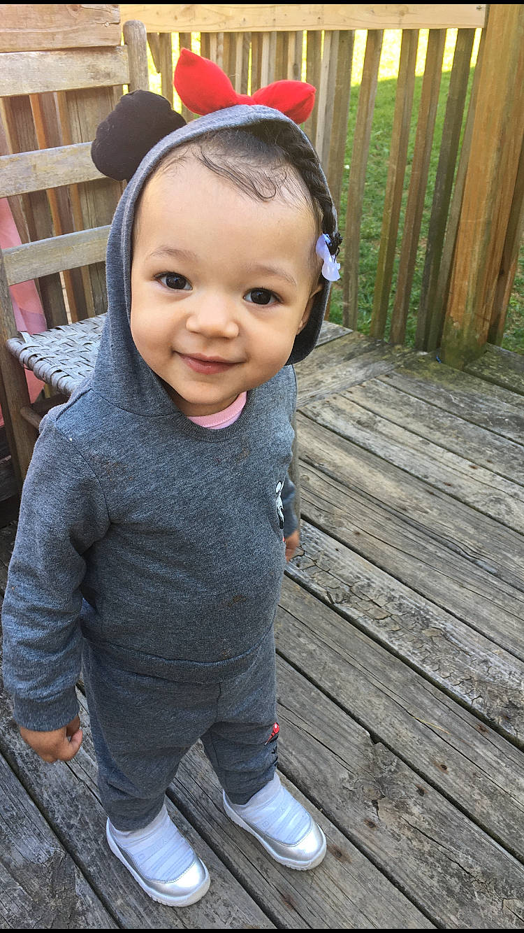 Kaelani is registered to the contest to win money with this photo: baby, beauty, cheek, child, cool, ear, face, hair_accessory, head, headband, headgear, joy, lip, nose, outerwear, people, person, pink, plant, skin