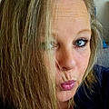 Nathalie J.