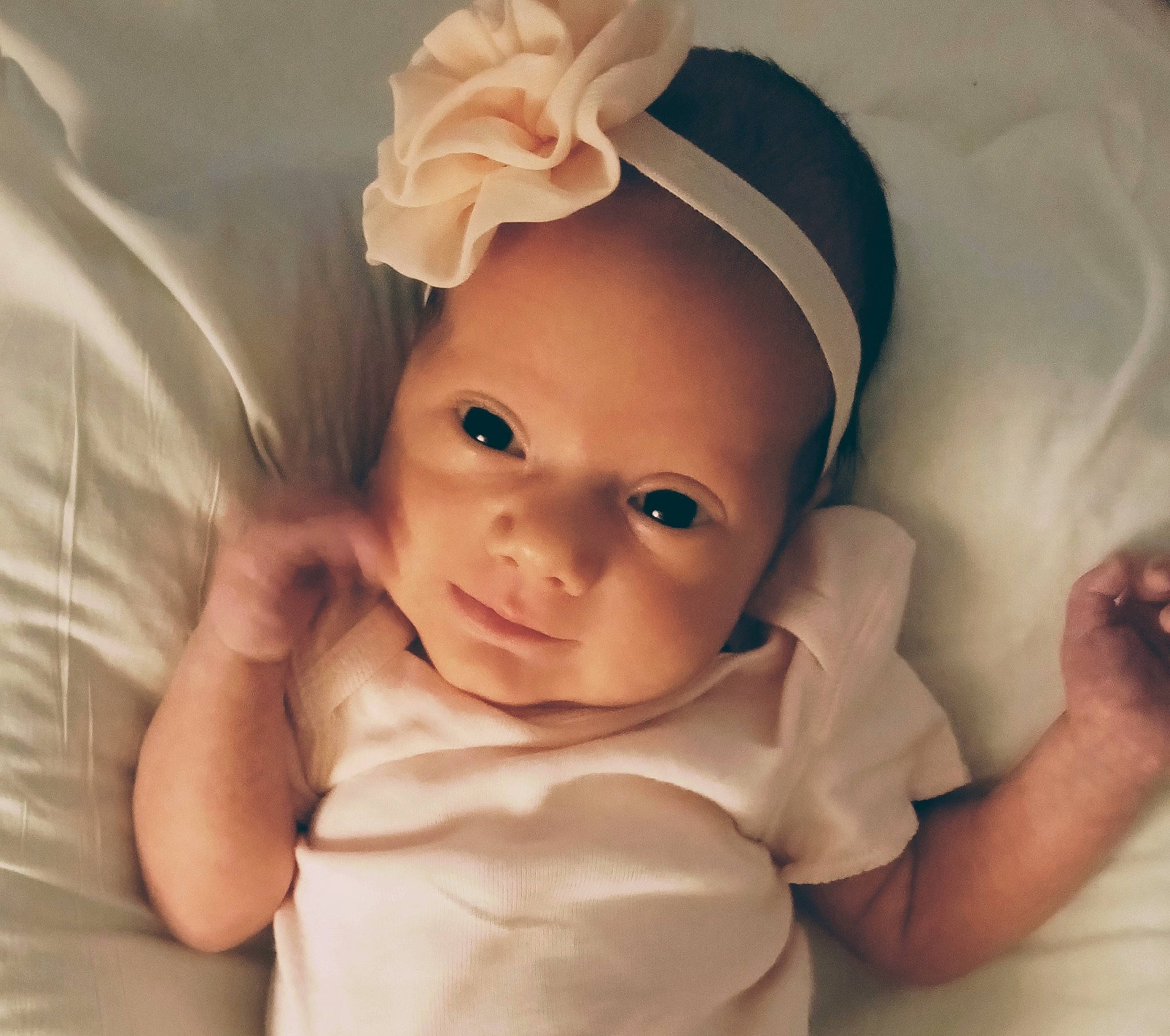 Natalie Rayne joined the competition — help win amazing prizes! baby, baby_sleeping, baby_toddler_clothing, cap, chin, comfort, eye, eyebrow, finger, gesture, happy, headpiece, human_body, linens, person, skin, sleeve, smile, textile, thumb