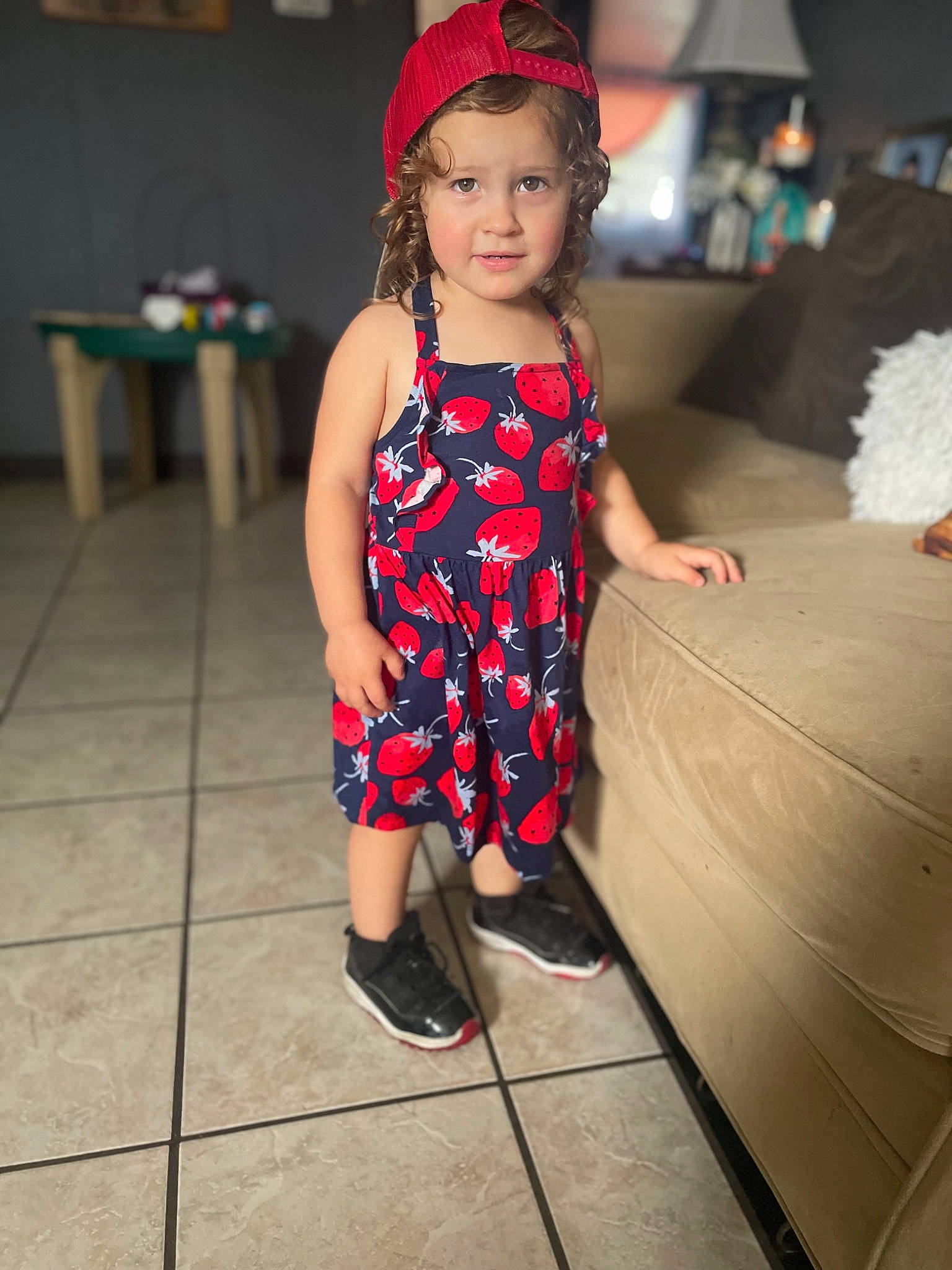 Callie is registered to the contest to win money with this photo: black_hair, child, day_dress, dress, event, eye, fashion, fashion_design, flash_photography, floor, flooring, formal_wear, fun, happy, human_leg, one_piece_garment, person, sandal, thigh, toddler